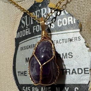 NWOT amethyst necklace wrapped faux gold. Please see pictures for measurements.
